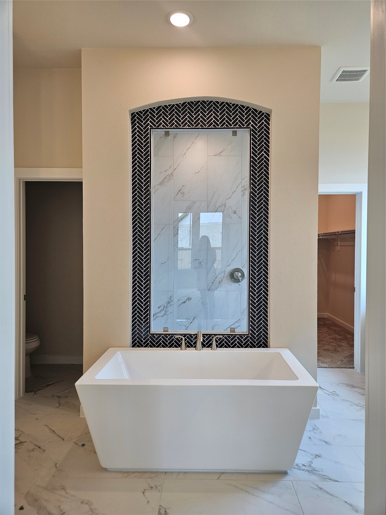 8701 Antelope Cyn Way Manvel, TX 77578 - Photo 22 of 32 a bathroom with a bathtub