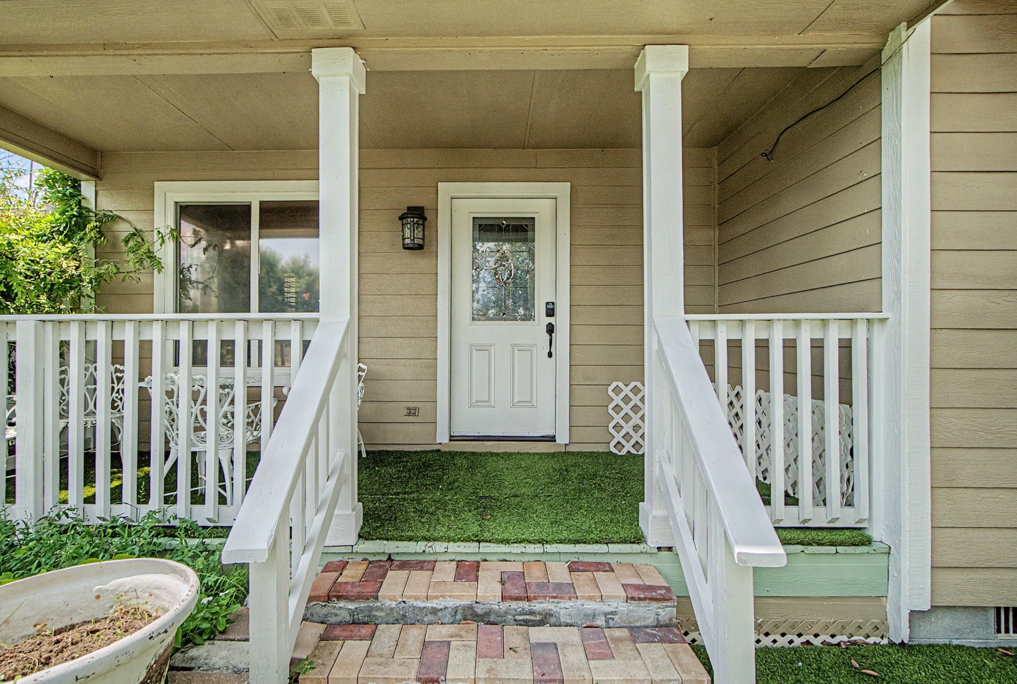 10034 Alfred Lane Houston, TX 77041 - Photo 11 of 50 Enjoy elevated views from the private balcony while taking in the beauty of the expansive yard below.