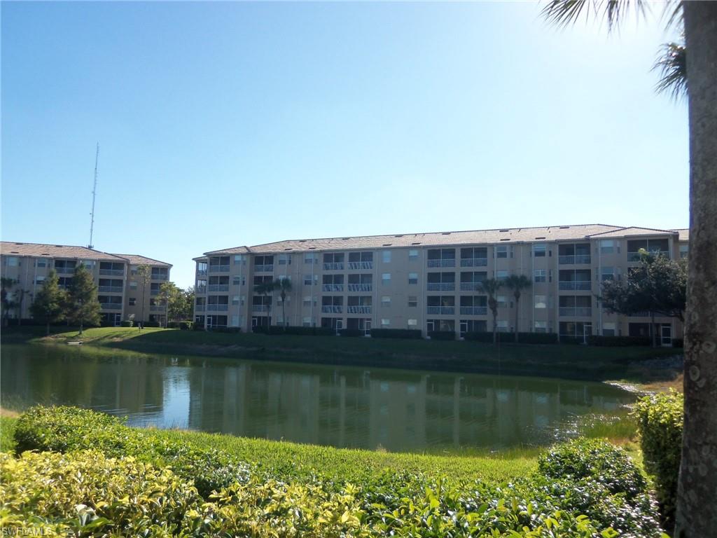 8490 Kingbird Loop, Unit 947 Estero, FL 33967 - Photo 5 of 16 a view of lake with city