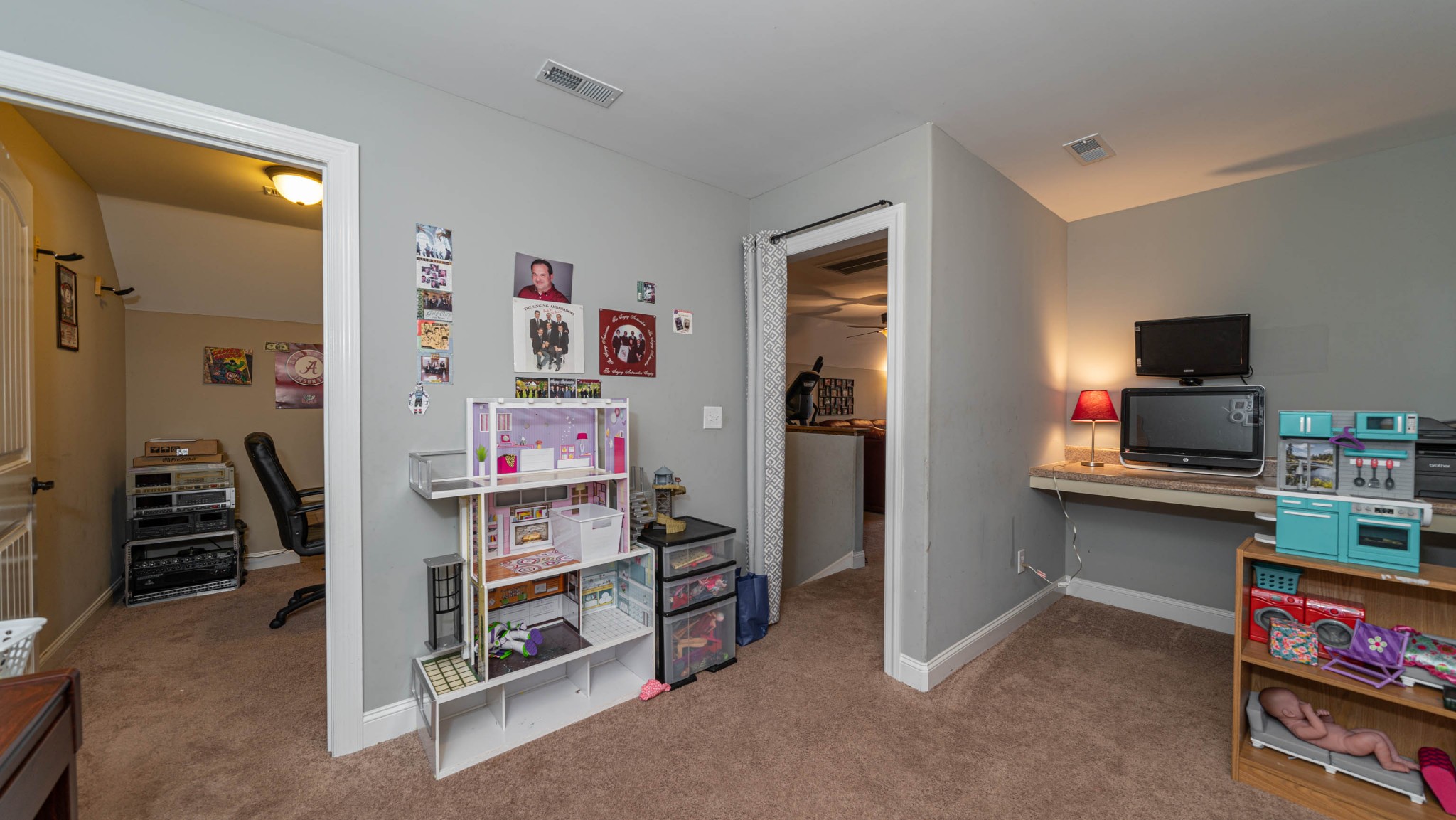 262 West Limestone Road Hazel Green, AL 35750 - Photo 27 of 45 a room with furniture and a flat screen tv