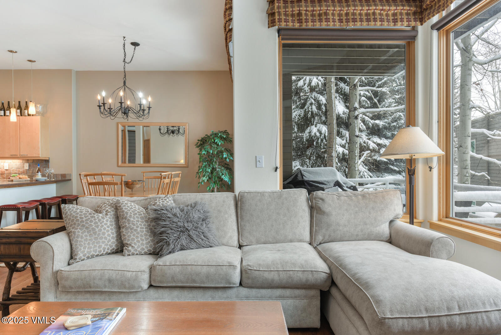 1230 Lions Ridge Loop, Unit 2D Vail, CO 81657 - Photo 20 of 42 a living room with furniture and a large window
