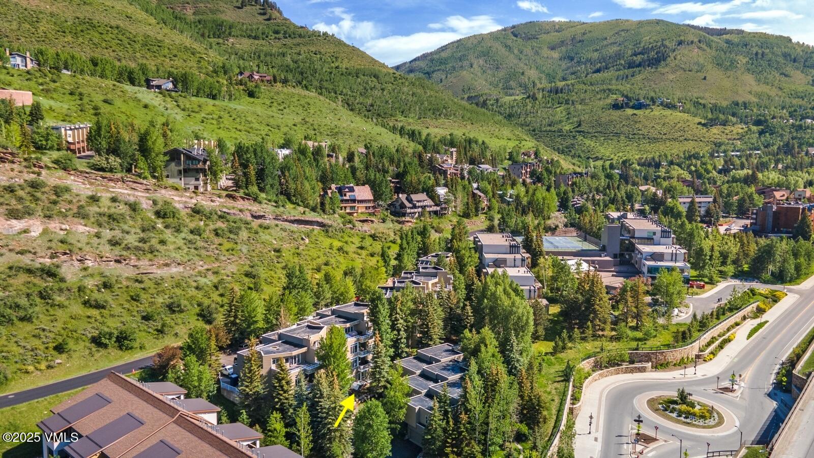 1230 Lions Ridge Loop, Unit 2D Vail, CO 81657 - Photo 36 of 42 a view of a city with tall buildings