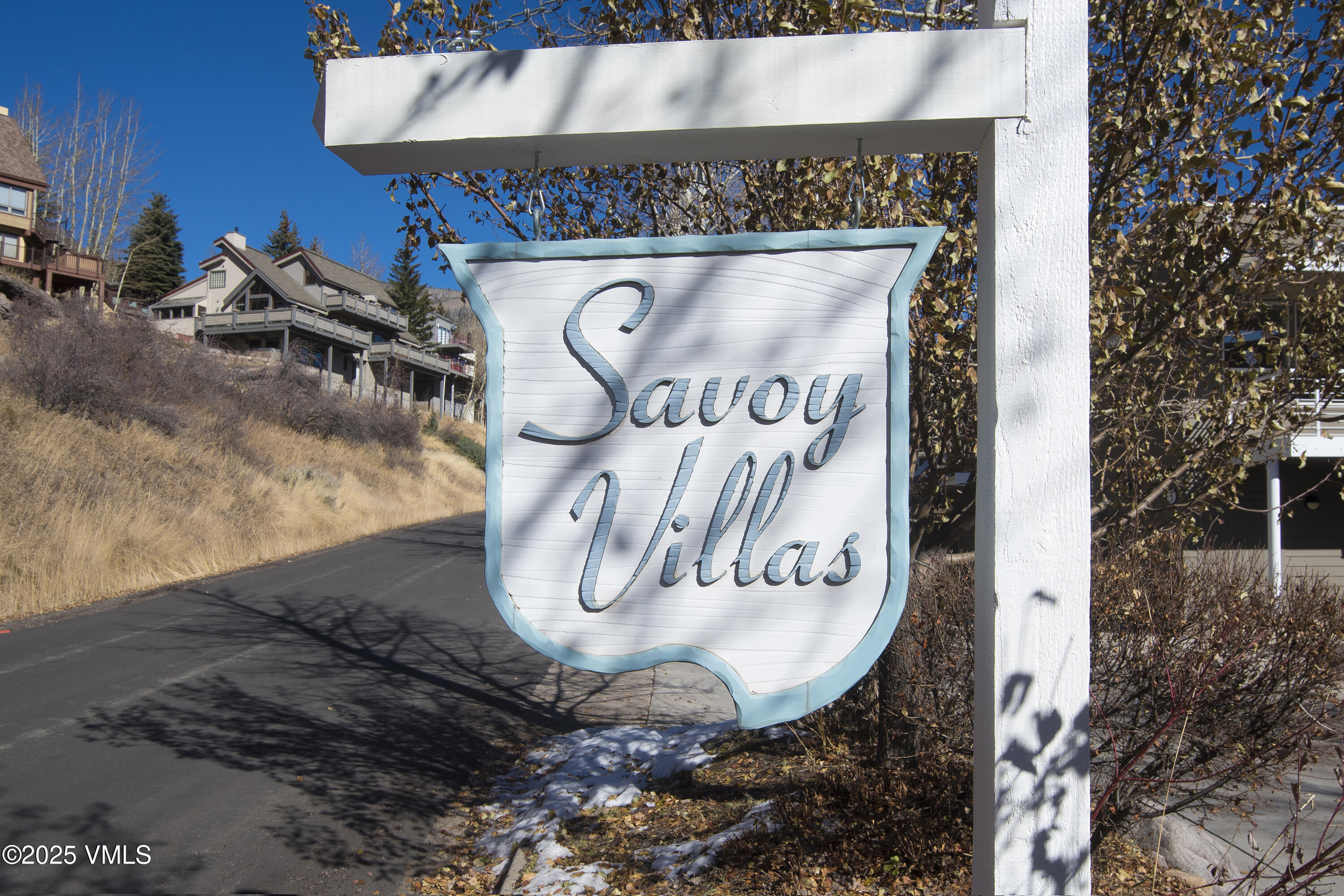 1230 Lions Ridge Loop, Unit 2D Vail, CO 81657 - Photo 42 of 42 a view of a fireplace with wooden fence
