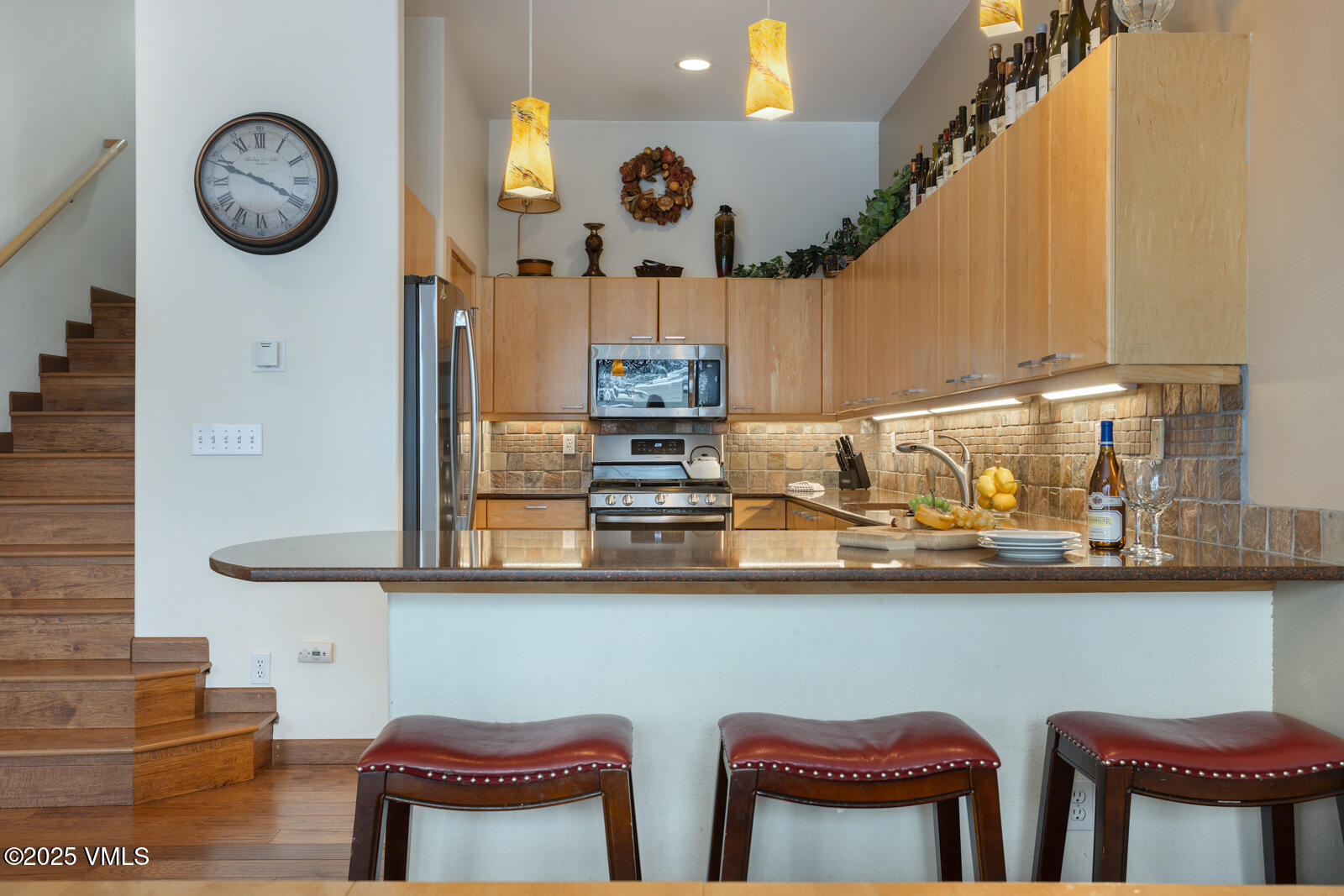 1230 Lions Ridge Loop, Unit 2D Vail, CO 81657 - Photo 10 of 42 a dining room with wooden floor