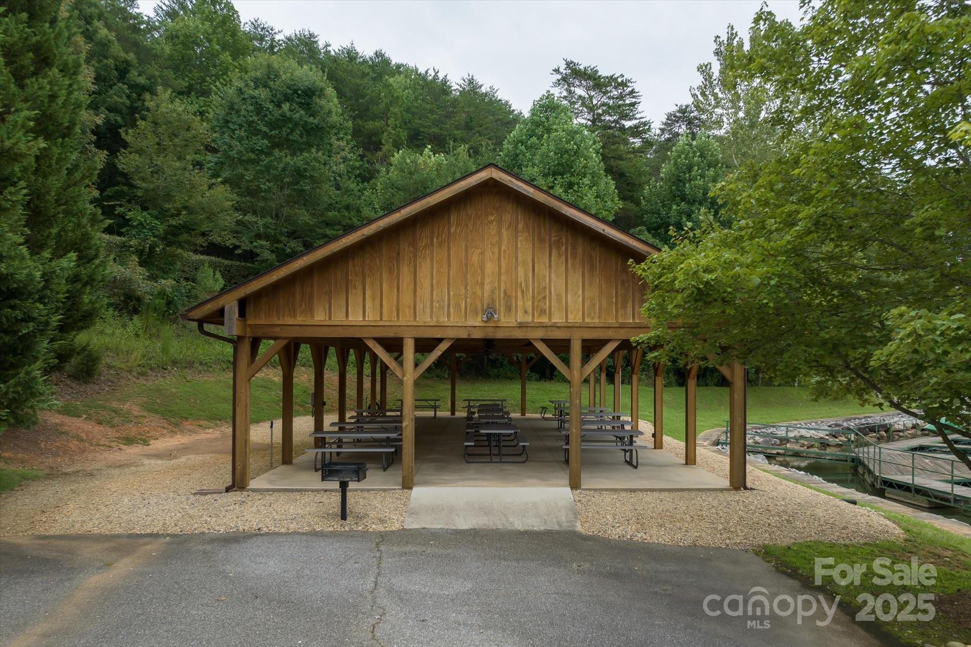 0 Twin Maple Way, Unit 5 Mill Spring, NC 28756 - Photo 13 of 16 a view of a house with backyard