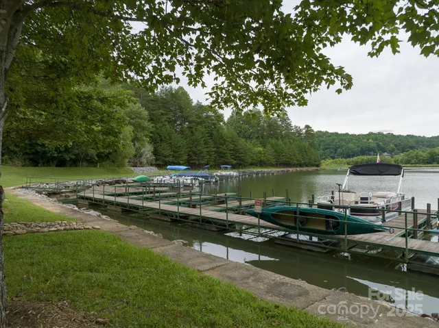 a view of a lake with trees by side of it