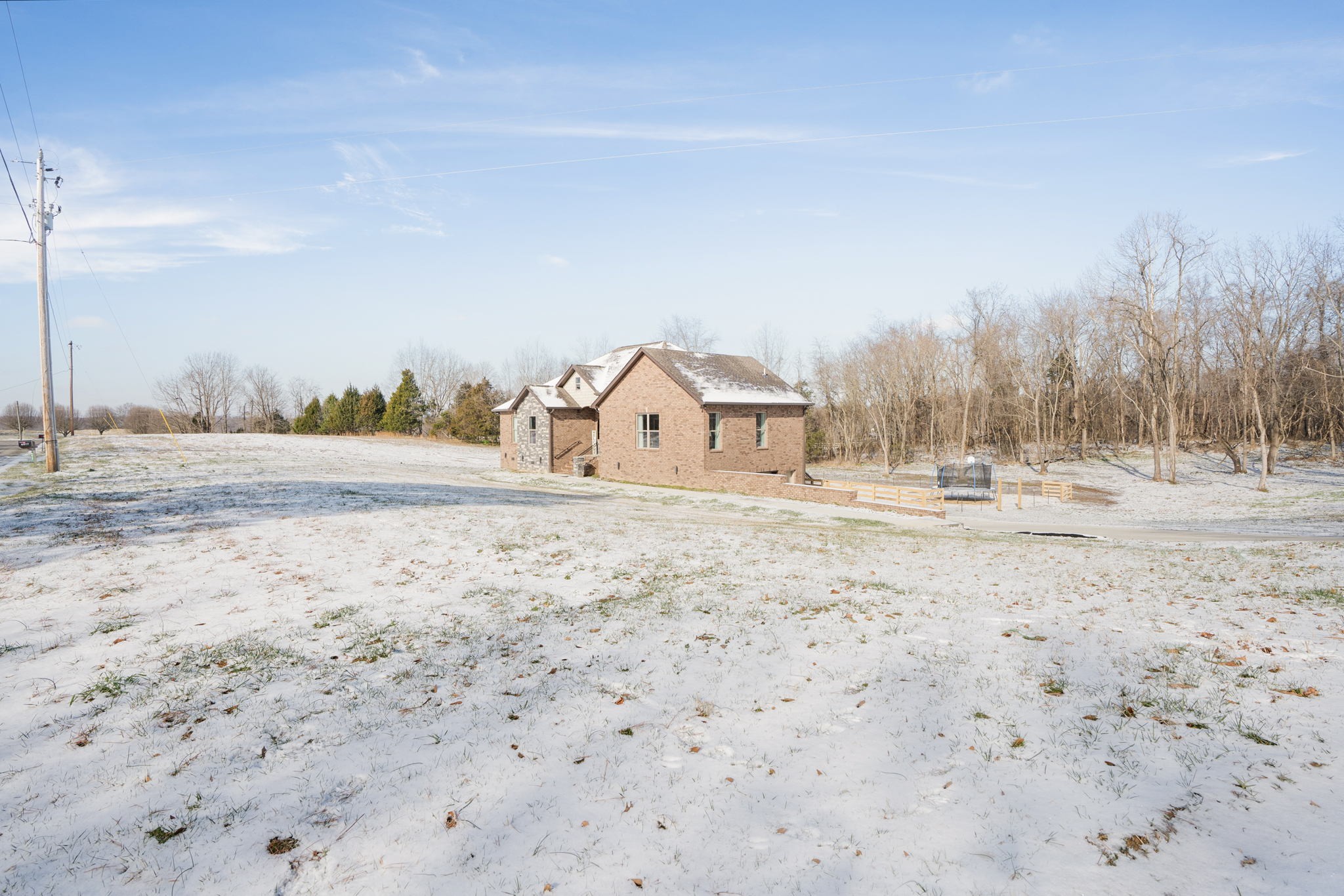 6622 Herbert Shannon Road Springfield, TN 37172 - Photo 3 of 30 a view of a dry yard with wooden fence