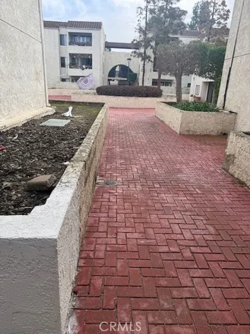 a view of a pathway both side of building