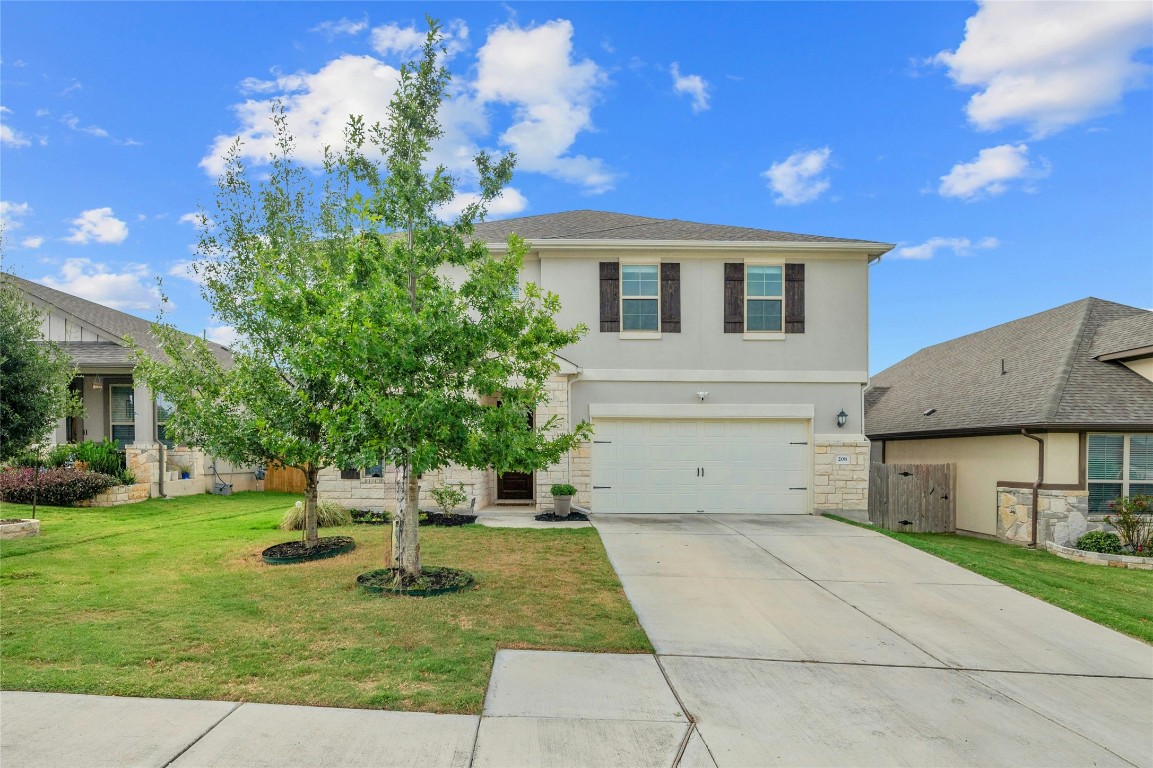 208 Windom Way Georgetown, TX 78626 - Photo 1 of 1 a house view with a garden space