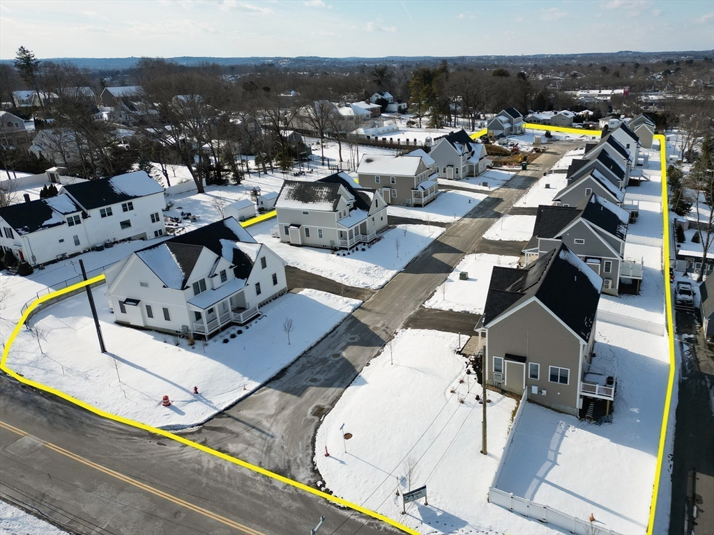 62 High Street, Unit LOT 7 Stoneham, MA 02180 - Photo 18 of 19 an aerial view of a house with outdoor space
