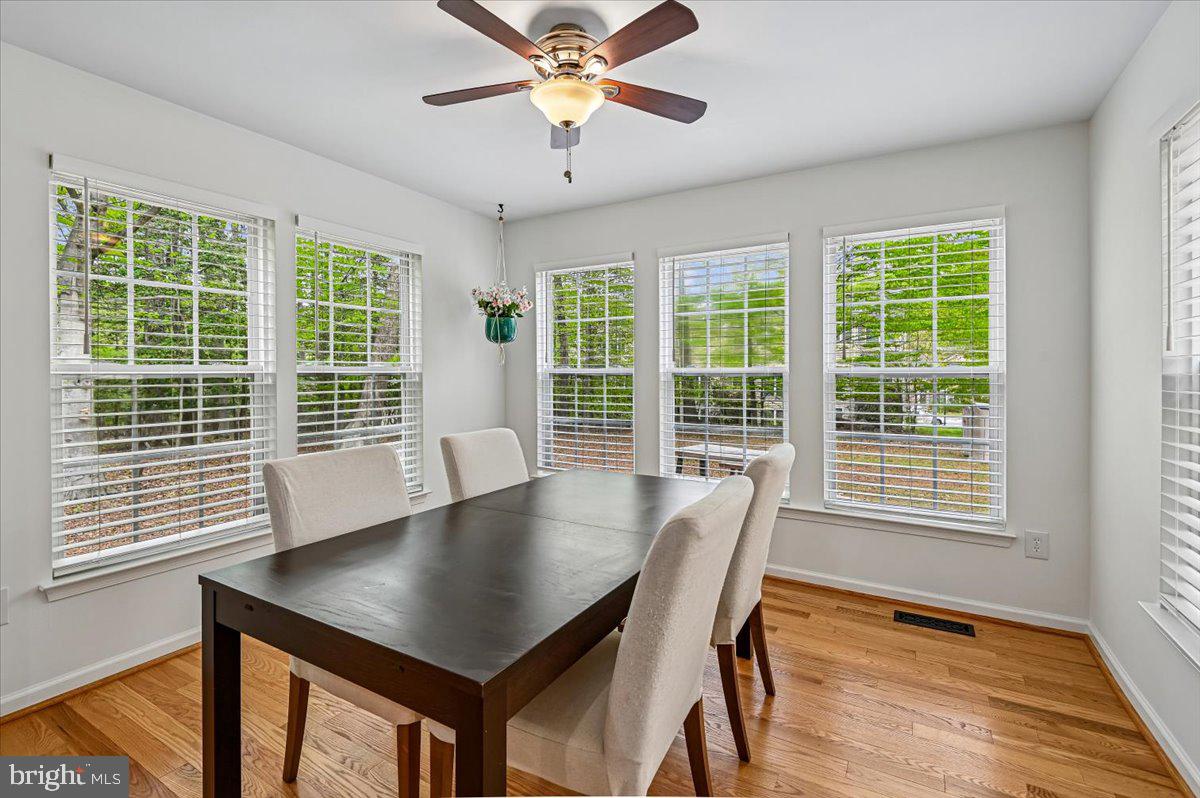 2401 High Brandy Way Odenton, MD 21113 - Photo 14 of 61 a view of a dining room with furniture and window