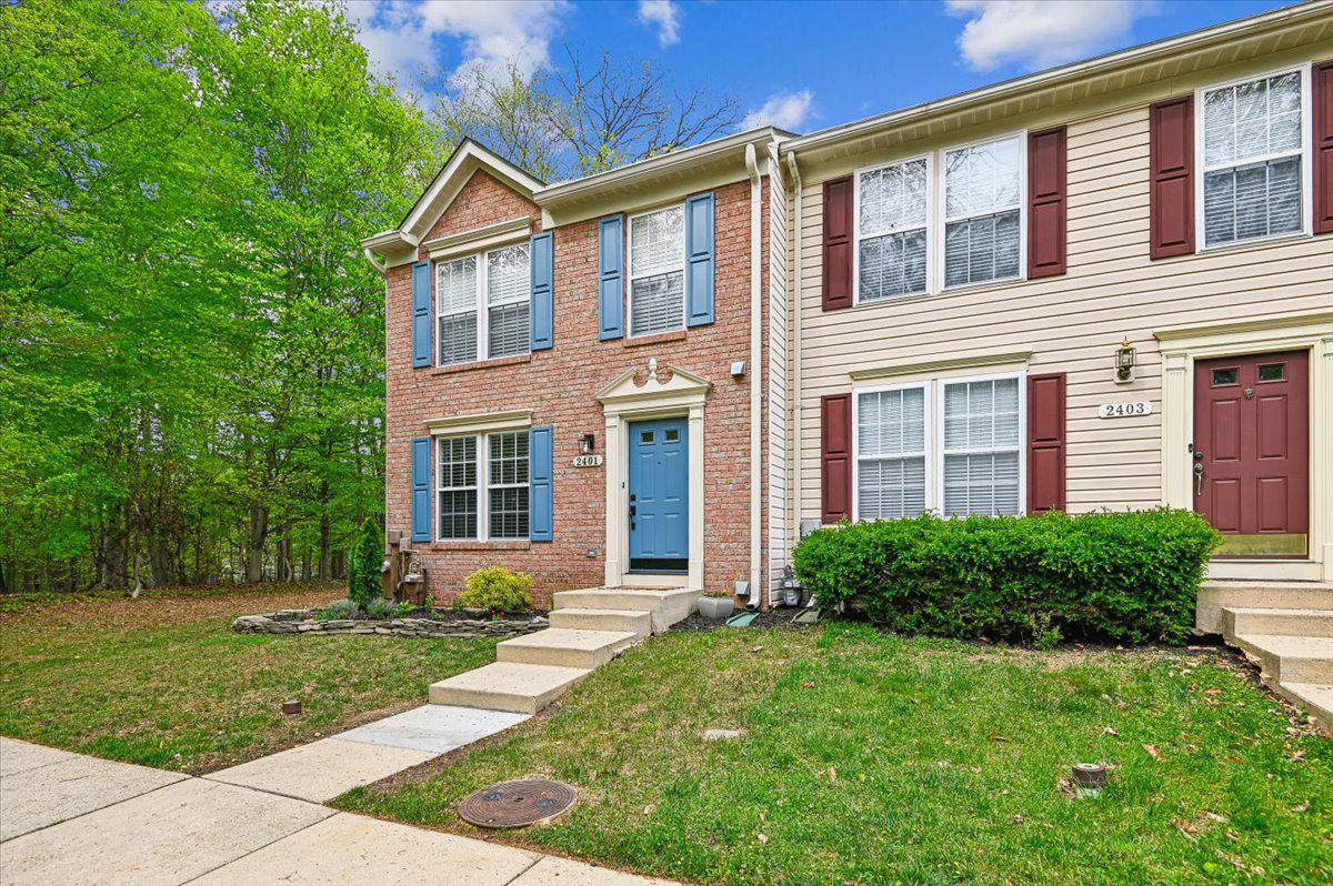 2401 High Brandy Way Odenton, MD 21113 - Photo 2 of 61 a front view of a house with garden and porch