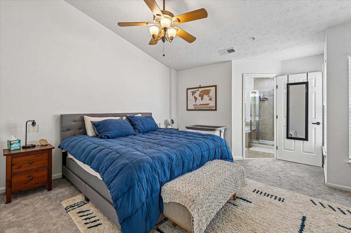 2401 High Brandy Way Odenton, MD 21113 - Photo 21 of 61 a spacious bedroom with a bed and a chandelier