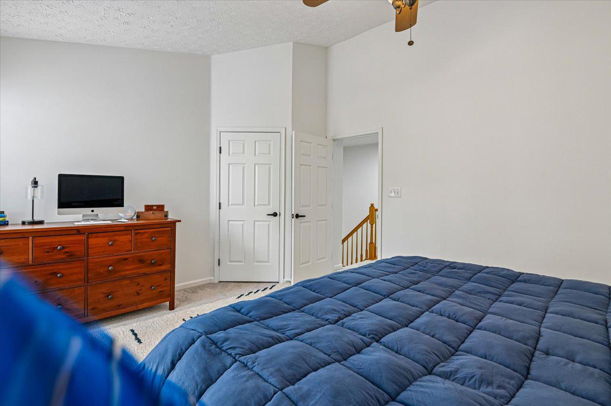 2401 High Brandy Way Odenton, MD 21113 - Photo 23 of 61 a bedroom with a bed and flat screen tv
