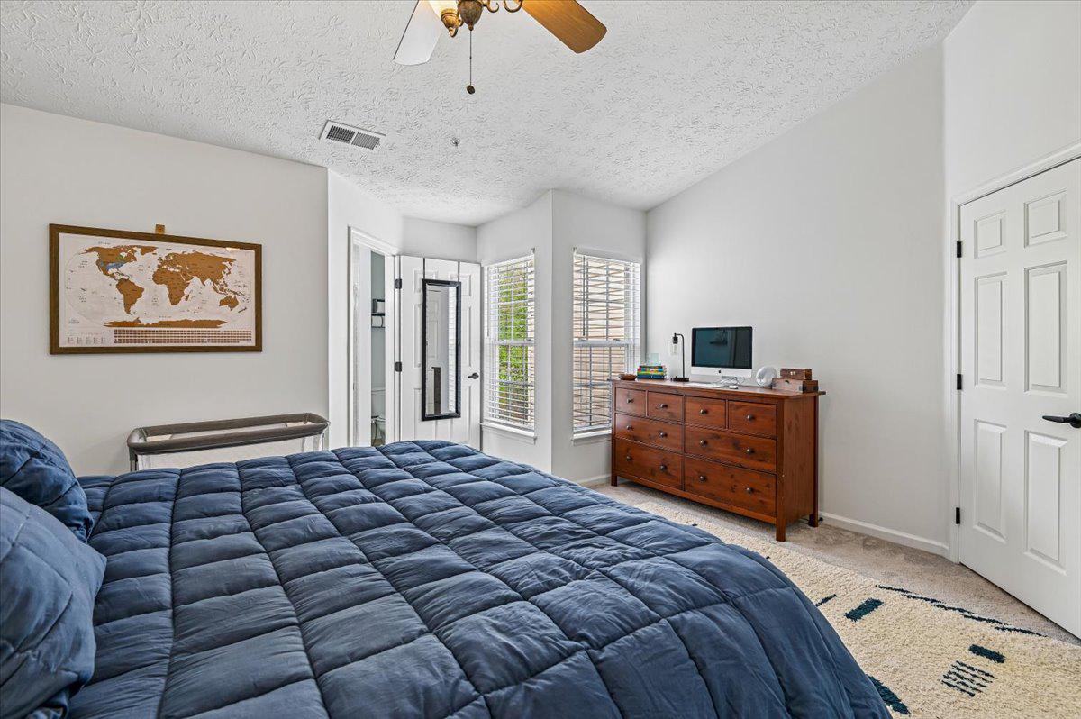 2401 High Brandy Way Odenton, MD 21113 - Photo 24 of 61 a bedroom with a bed and wooden floor