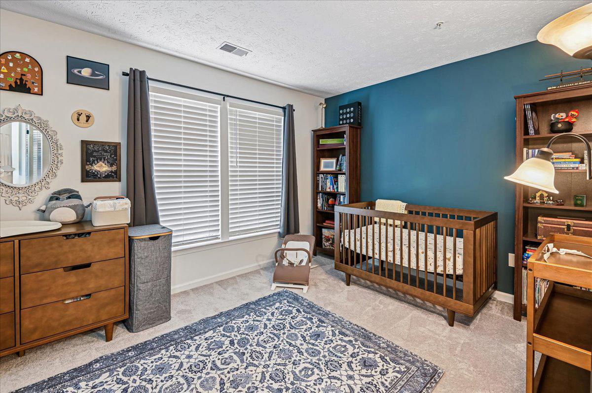 2401 High Brandy Way Odenton, MD 21113 - Photo 27 of 61 a bedroom with furniture and a window