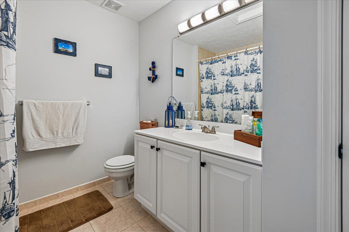 2401 High Brandy Way Odenton, MD 21113 - Photo 30 of 61 a bathroom with a sink toilet and shower