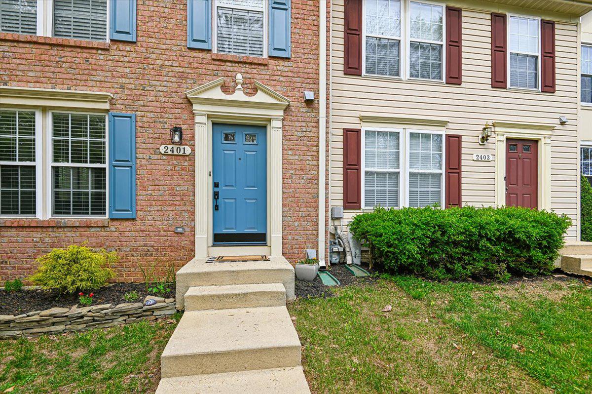2401 High Brandy Way Odenton, MD 21113 - Photo 3 of 61 a front view of a house with garden