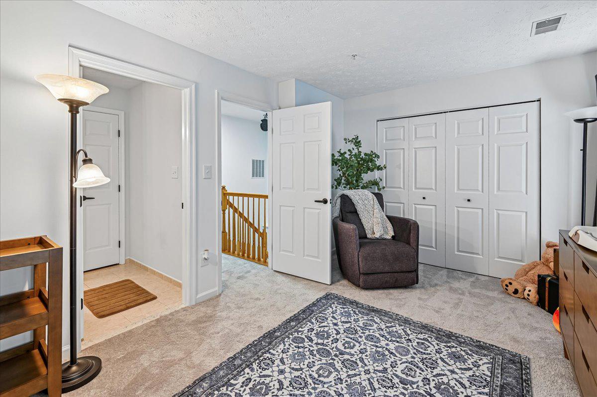 2401 High Brandy Way Odenton, MD 21113 - Photo 32 of 61 a living room with furniture and a rug