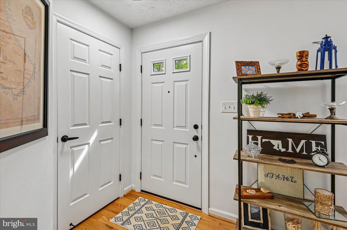 2401 High Brandy Way Odenton, MD 21113 - Photo 4 of 61 a view of an entryway with wooden floor