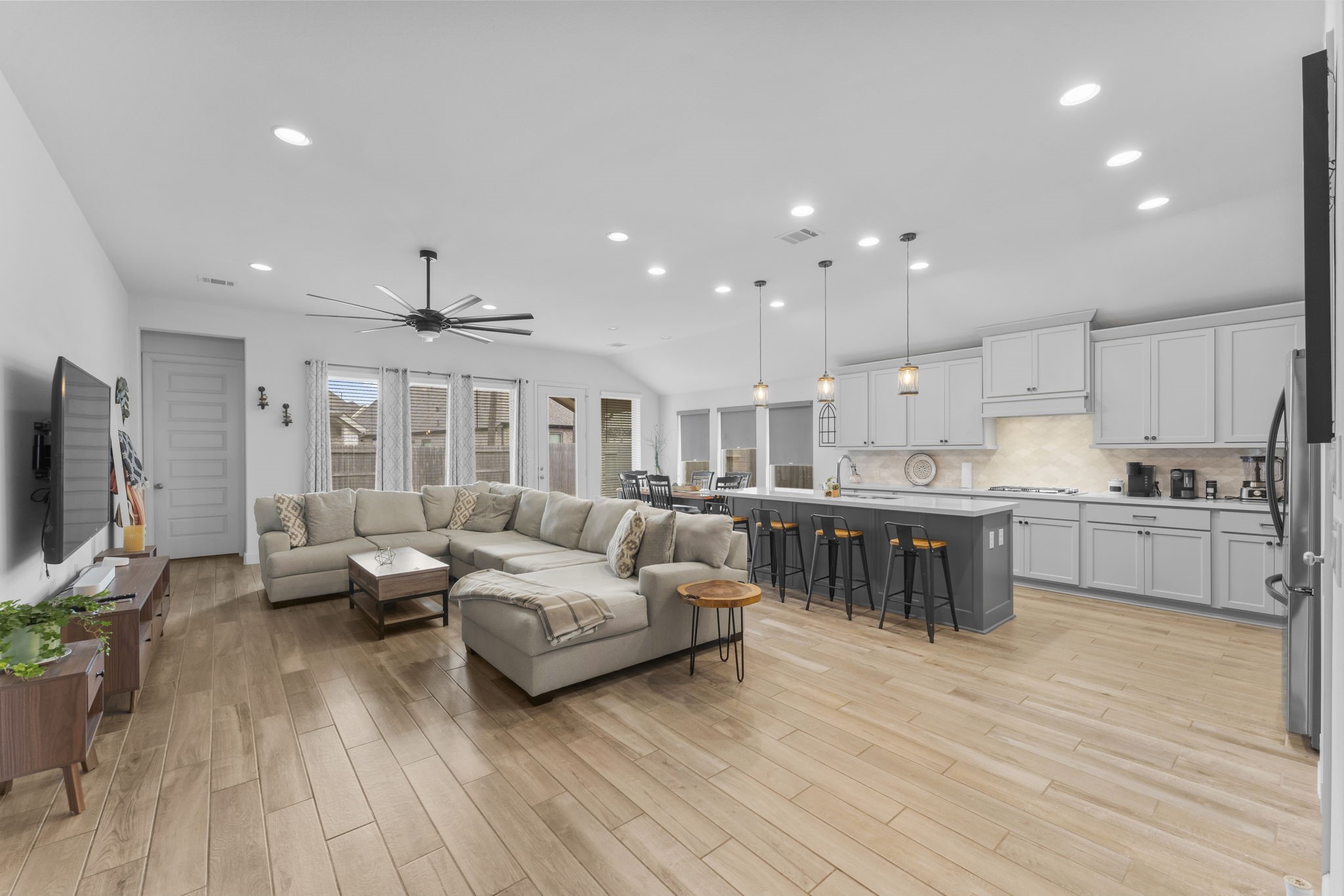 17163 Sandstone Street Conroe, TX 77302 - Photo 2 of 31 a living room with furniture and a wooden floor