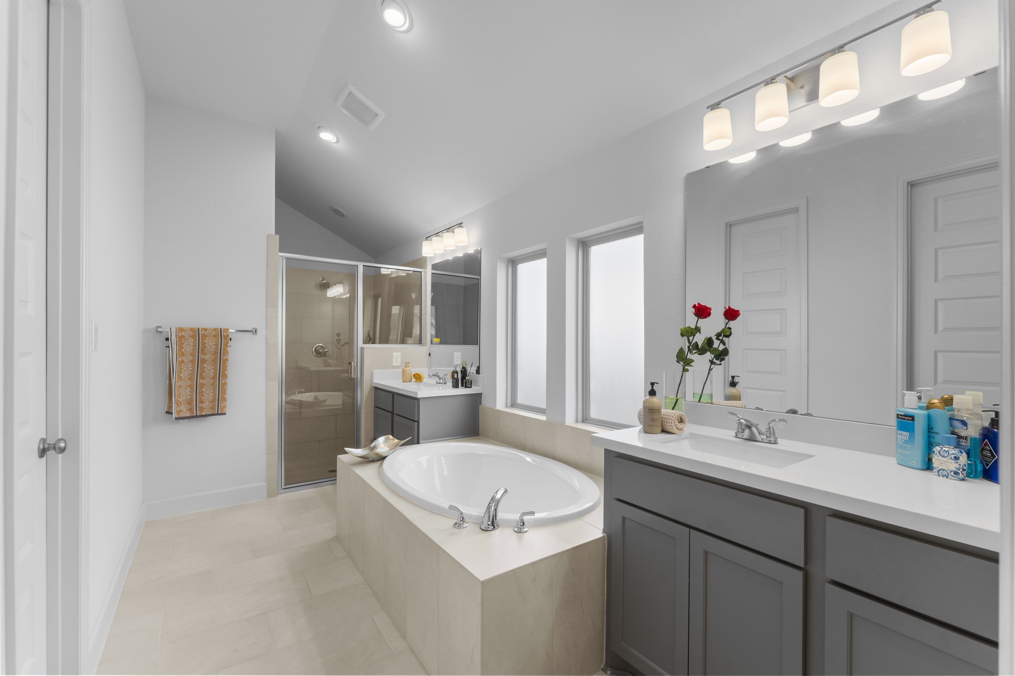 17163 Sandstone Street Conroe, TX 77302 - Photo 24 of 31 a bathroom with a sink and a mirror