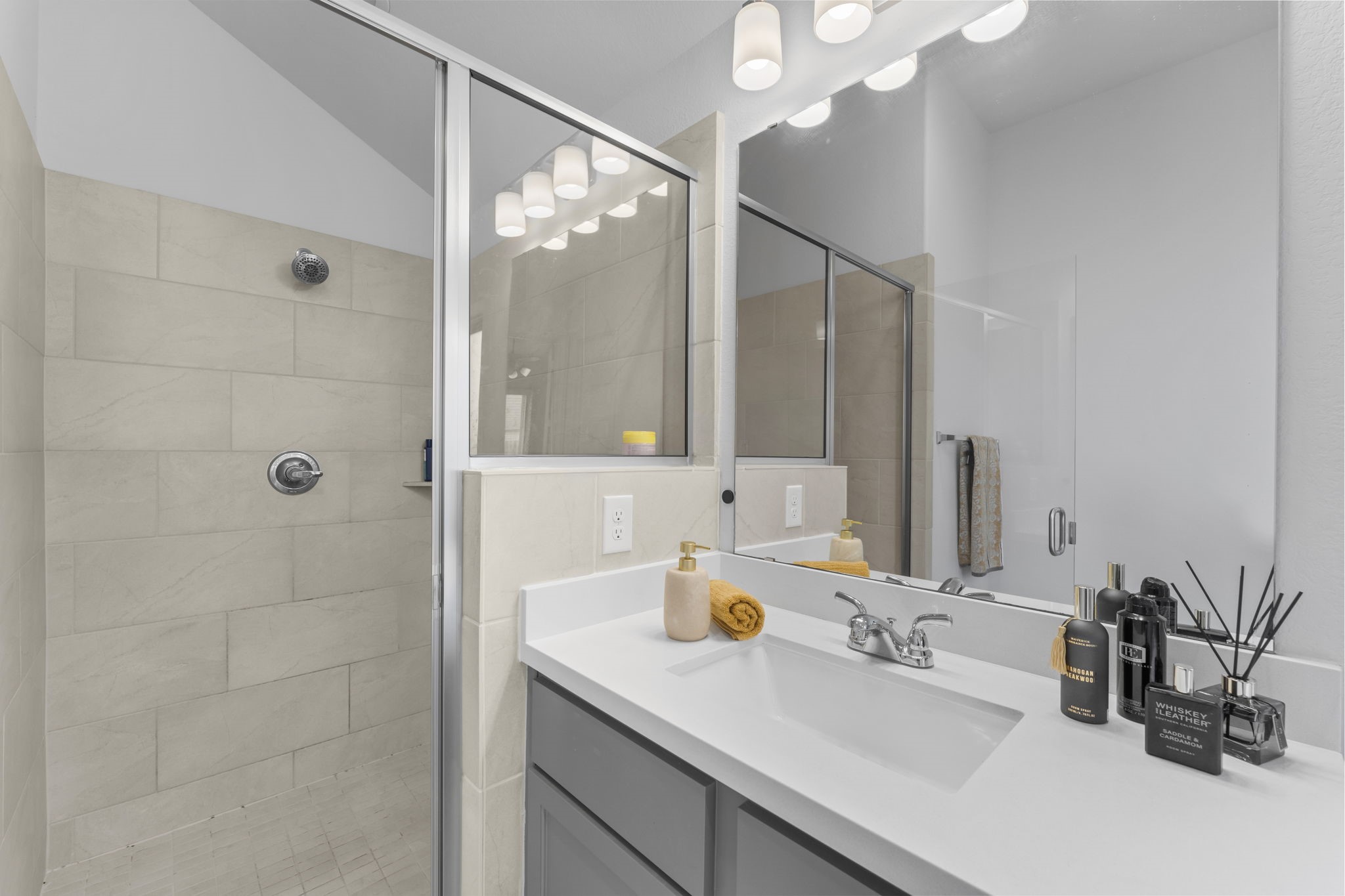 17163 Sandstone Street Conroe, TX 77302 - Photo 25 of 31 a bathroom with a sink double vanity and a mirror