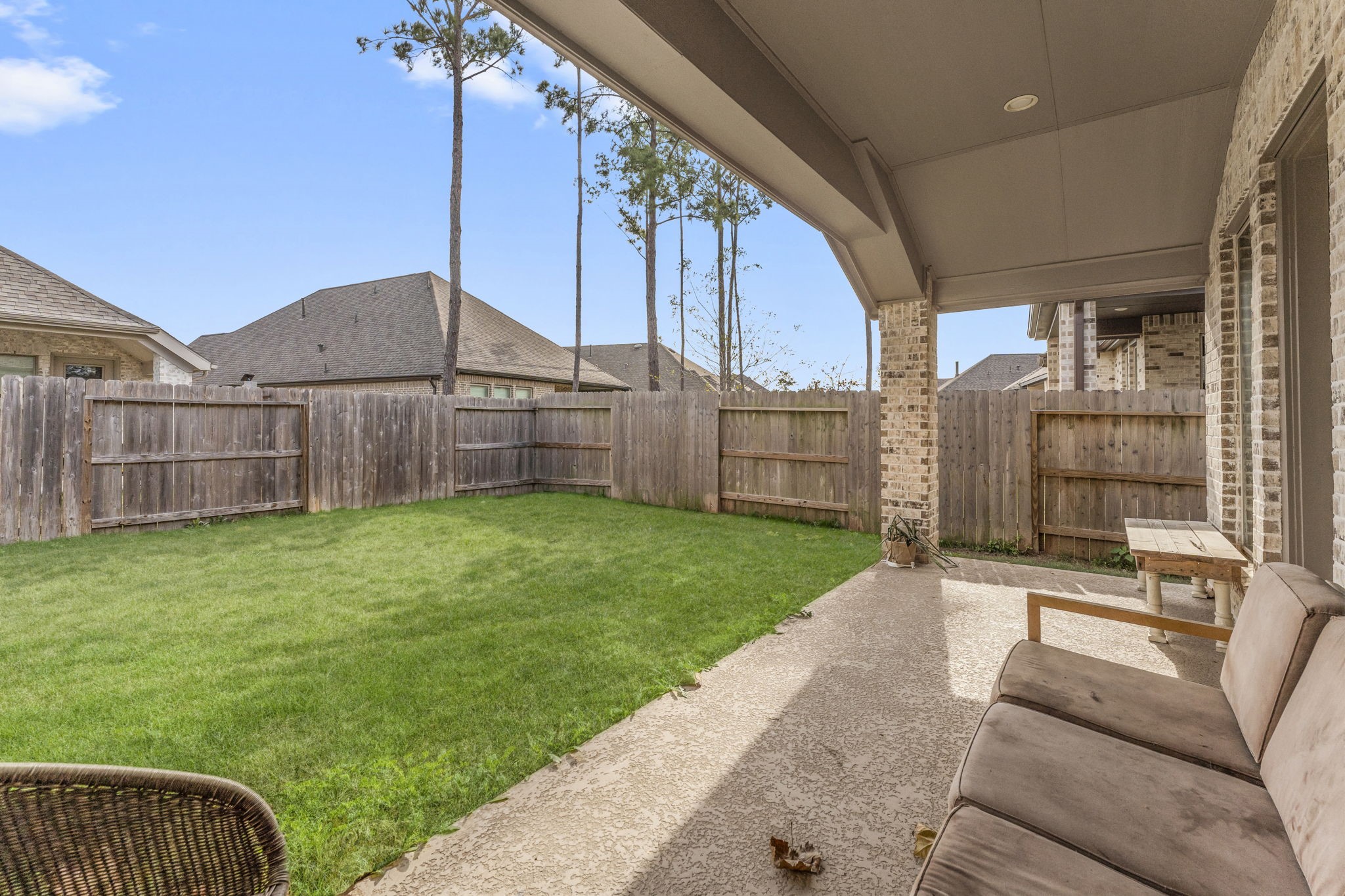 17163 Sandstone Street Conroe, TX 77302 - Photo 29 of 31 a view of a porch with a backyard