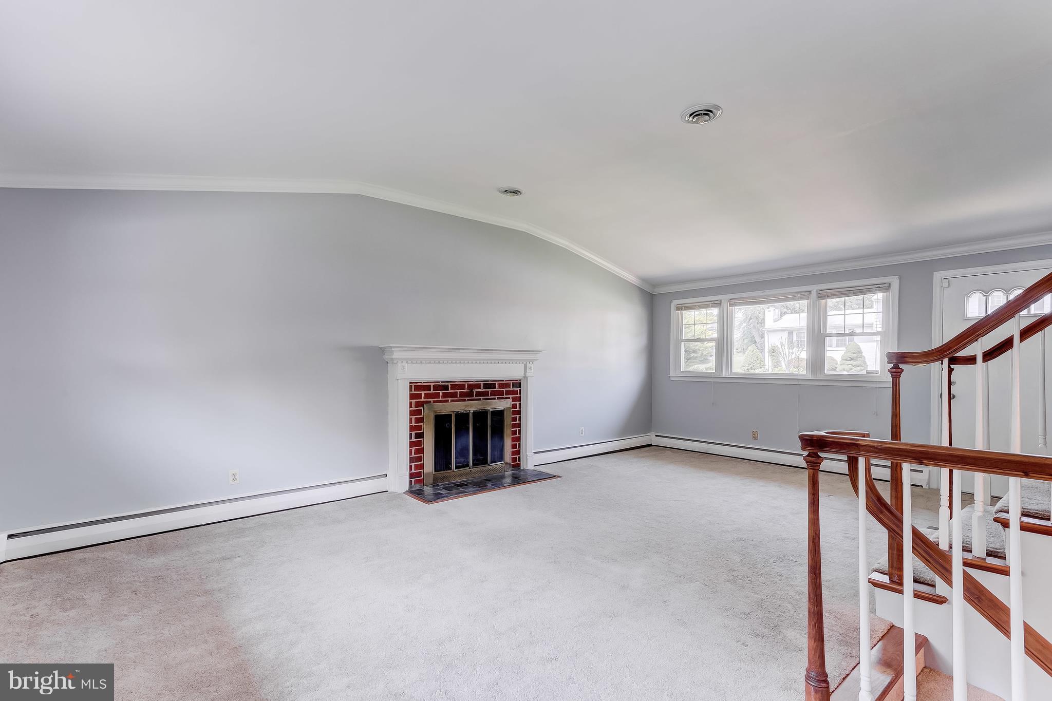 205 Coldbrook Road Lutherville-Timonium, MD 21093 - Photo 13 of 30 Cathedral Ceiling and Wood Burning Fireplace