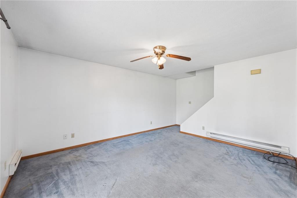 136 Bottom Road Mill Run, PA 15464 - Photo 5 of 26 wooden floor in an empty room