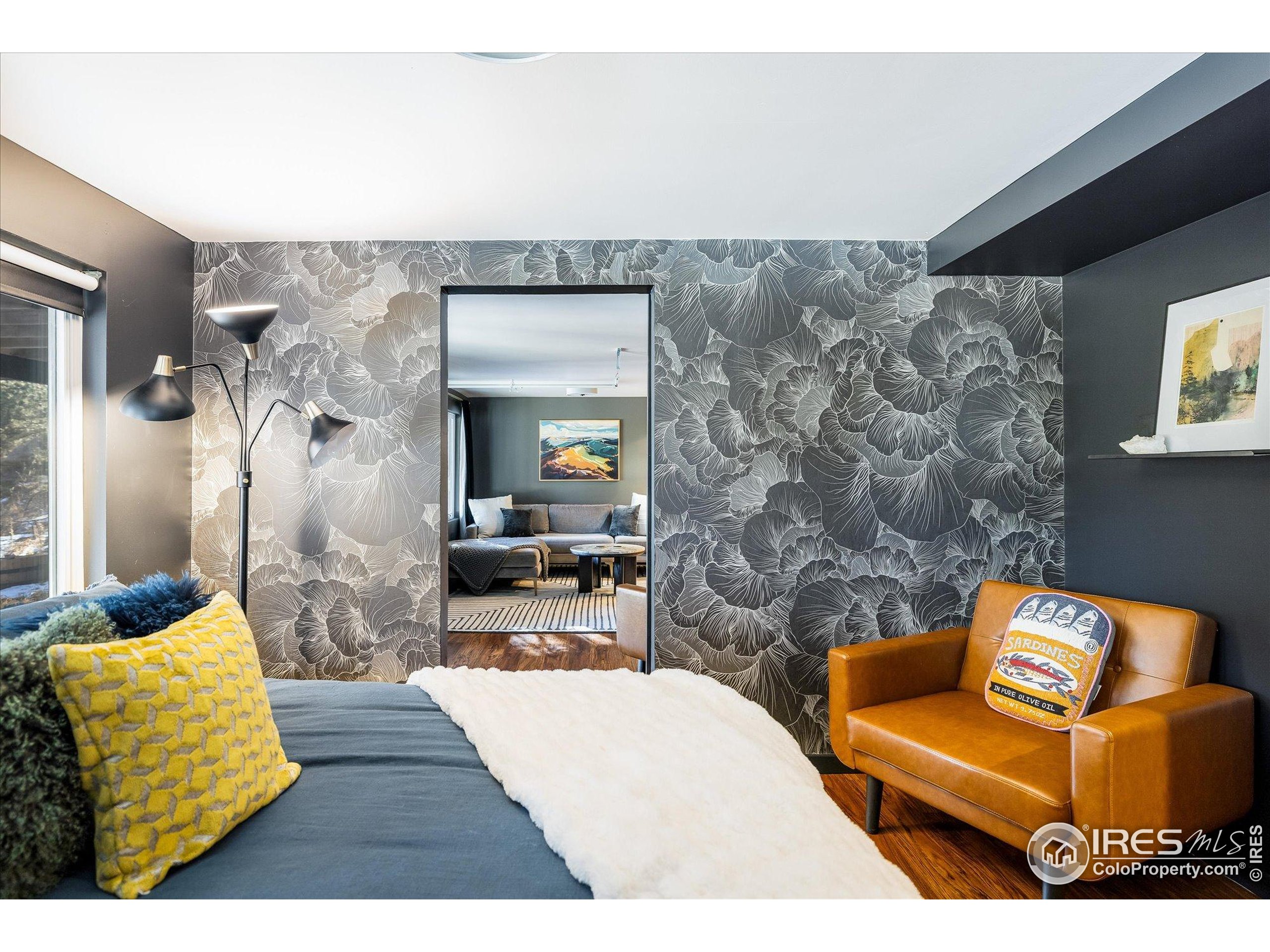 781 Cold Springs Road Boulder, CO 80302 - Photo 22 of 36 a living room with furniture and a rug