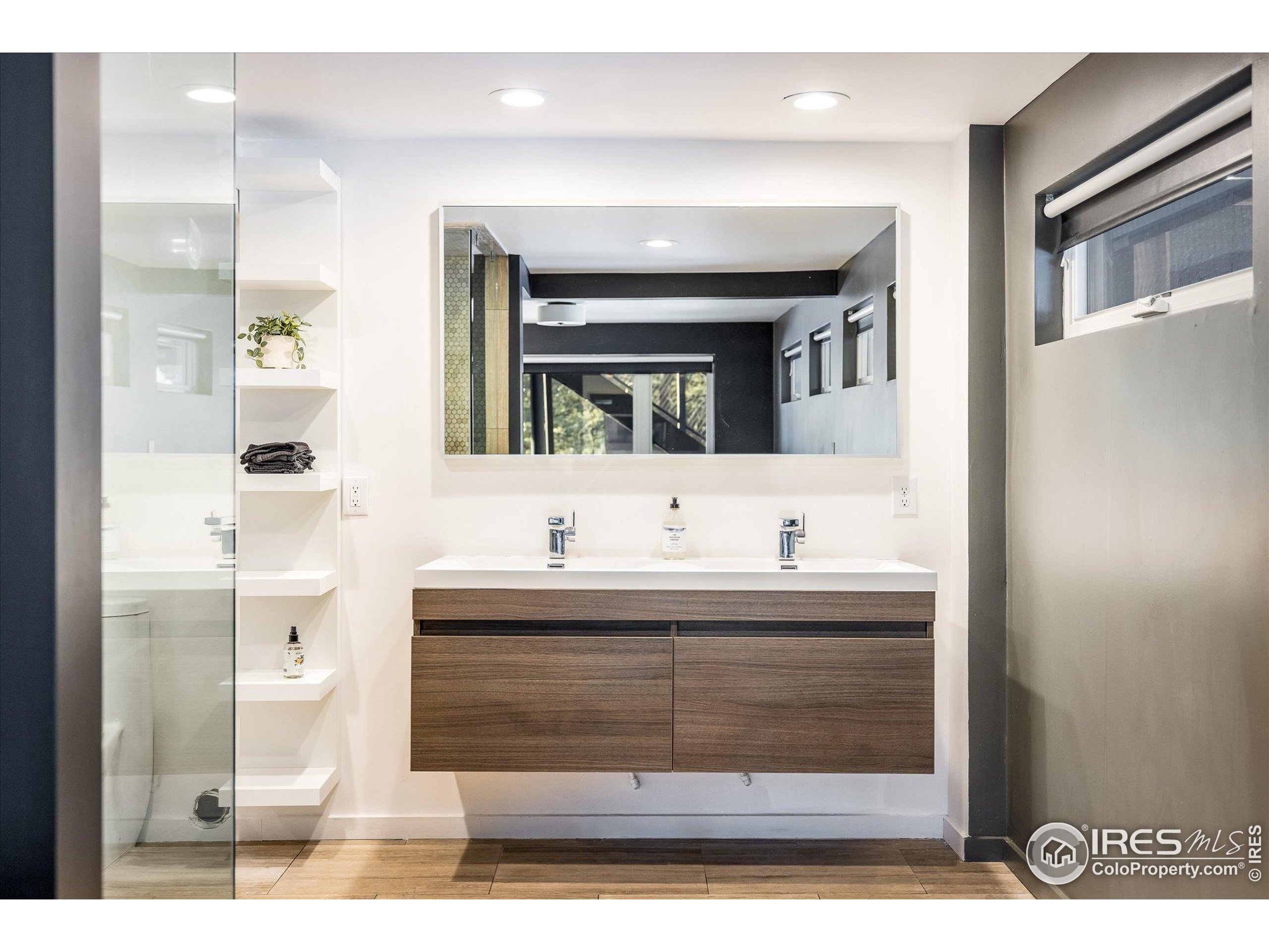 781 Cold Springs Road Boulder, CO 80302 - Photo 24 of 36 a bathroom with a sink and a mirror
