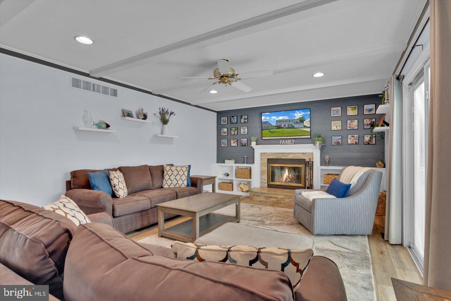 166 Country Farms Road Marlton, NJ 08053 - Photo 27 of 68 a living room with furniture a fireplace and a flat screen tv