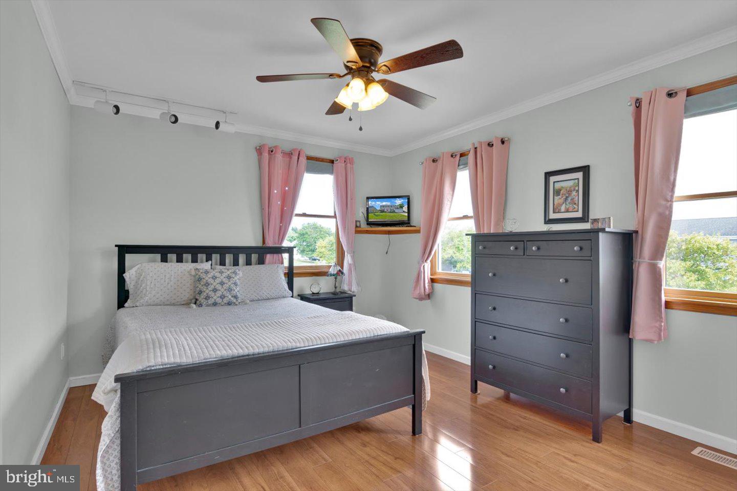 166 Country Farms Road Marlton, NJ 08053 - Photo 49 of 68 a bedroom with a large bed and a dresser