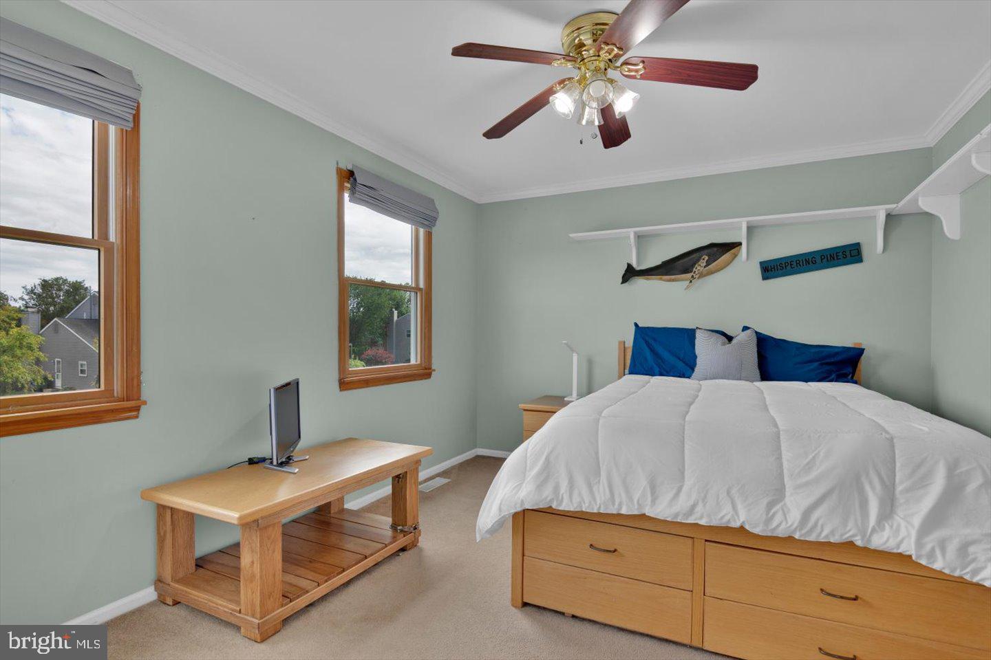 166 Country Farms Road Marlton, NJ 08053 - Photo 52 of 68 a bedroom with a bed and a chandelier