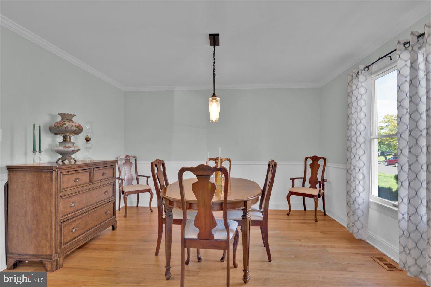 166 Country Farms Road Marlton, NJ 08053 - Photo 6 of 68 a dining room with furniture wooden floor a rug and a painting