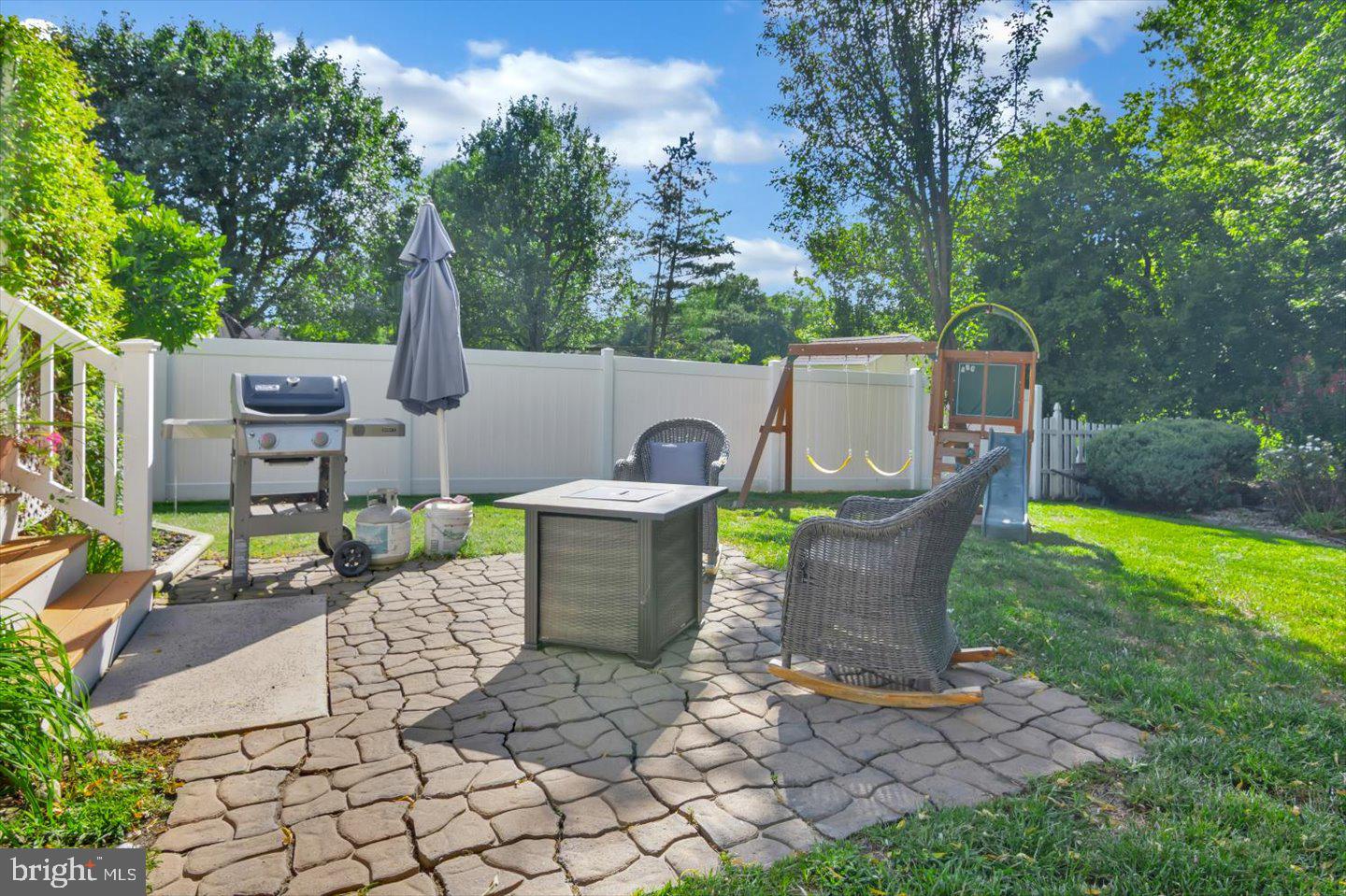166 Country Farms Road Marlton, NJ 08053 - Photo 63 of 68 a view of a patio with table and chairs potted plants with wooden fence