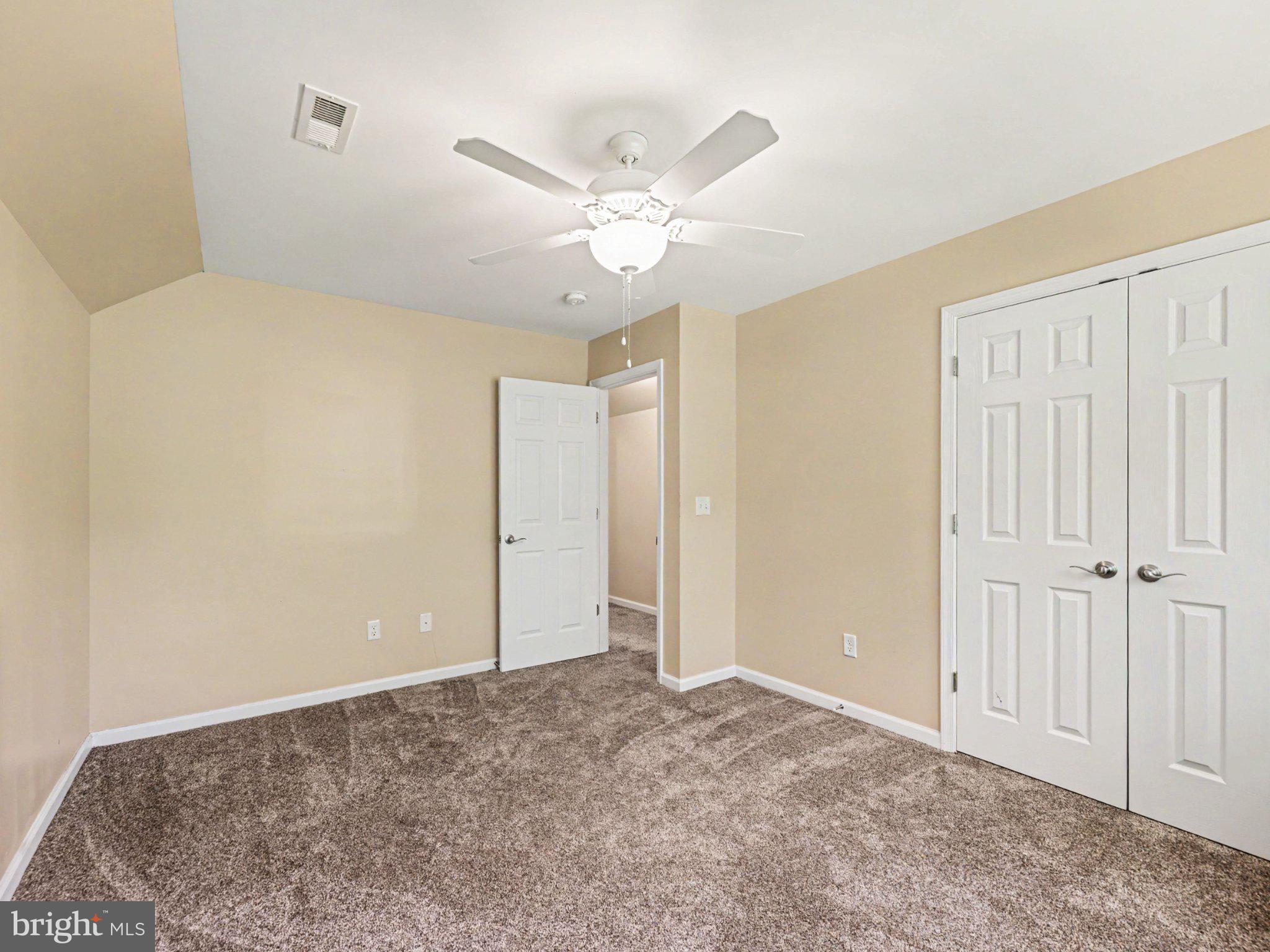 9811 Catharpin Road Spotsylvania, VA 22551 - Photo 19 of 30 a view of a livingroom with a ceiling fan