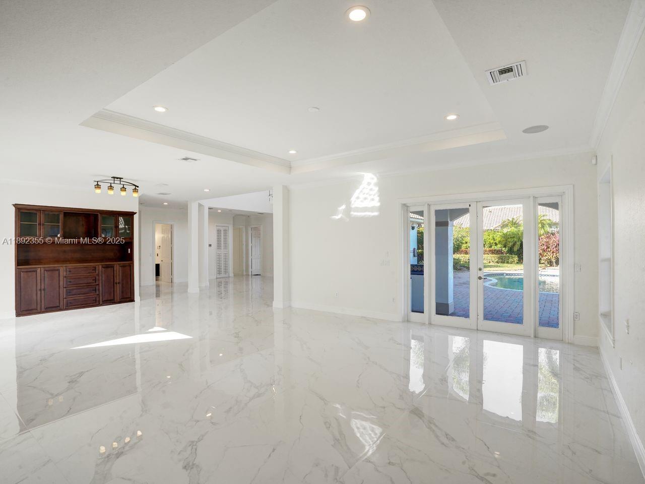 14403 Jockey Circle Davie, FL 33330 - Photo 19 of 53 a view of lobby with furniture and a flat screen tv