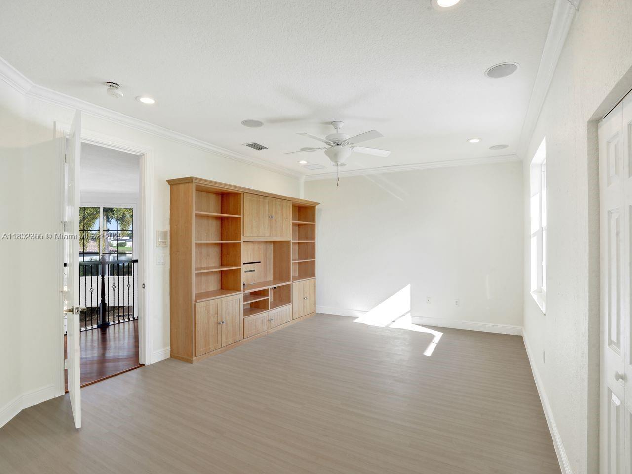 14403 Jockey Circle Davie, FL 33330 - Photo 27 of 53 an empty room with closet and windows