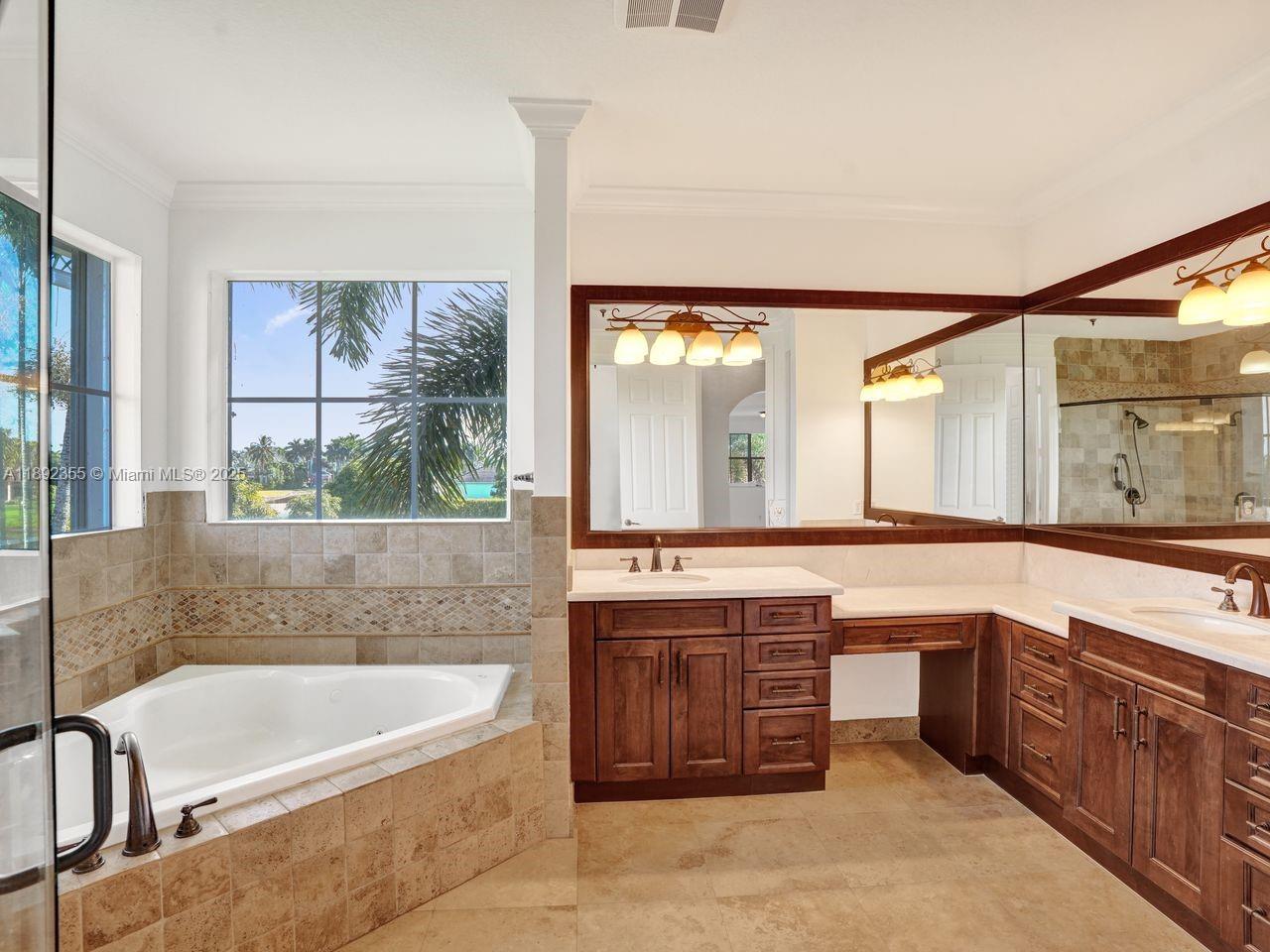 14403 Jockey Circle Davie, FL 33330 - Photo 37 of 53 a bathroom with a large tub sink and double vanity