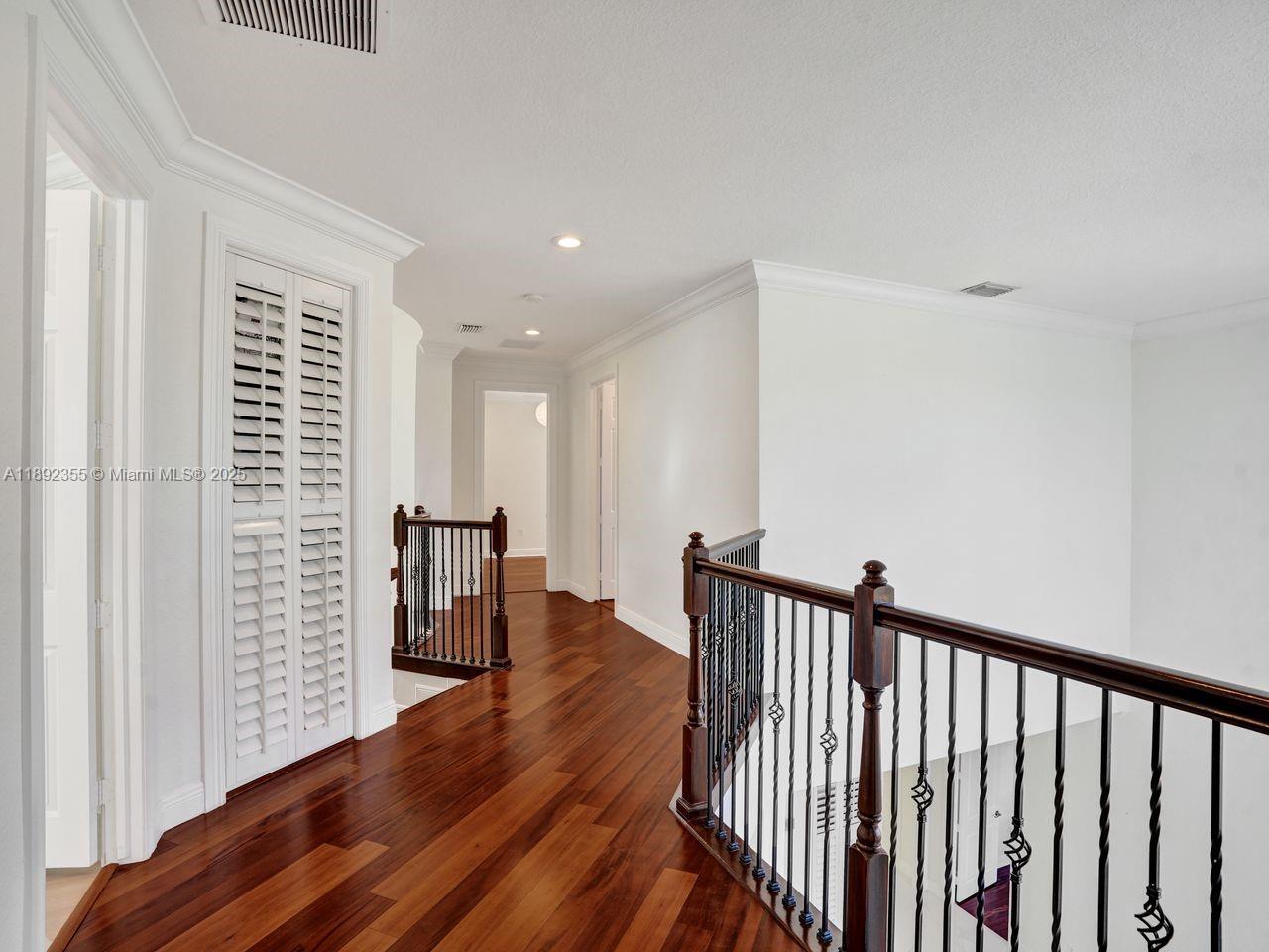 14403 Jockey Circle Davie, FL 33330 - Photo 38 of 53 a view of hallway with wooden floor