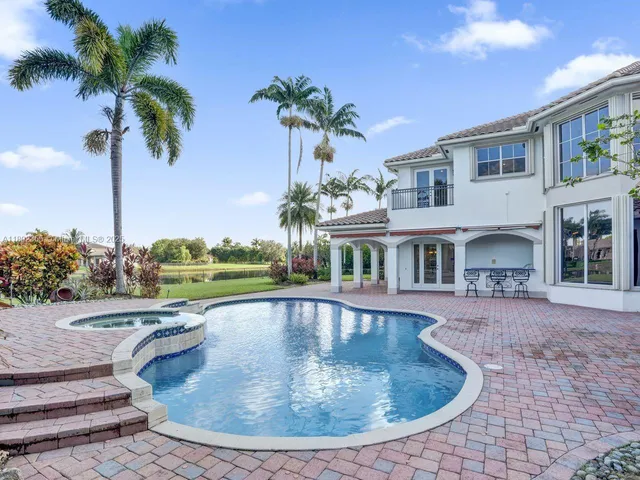 a view of lake with green space