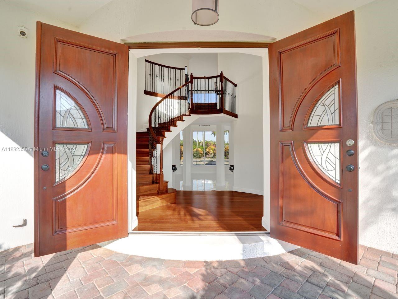 14403 Jockey Circle Davie, FL 33330 - Photo 10 of 53 a view of a entryway door of the house
