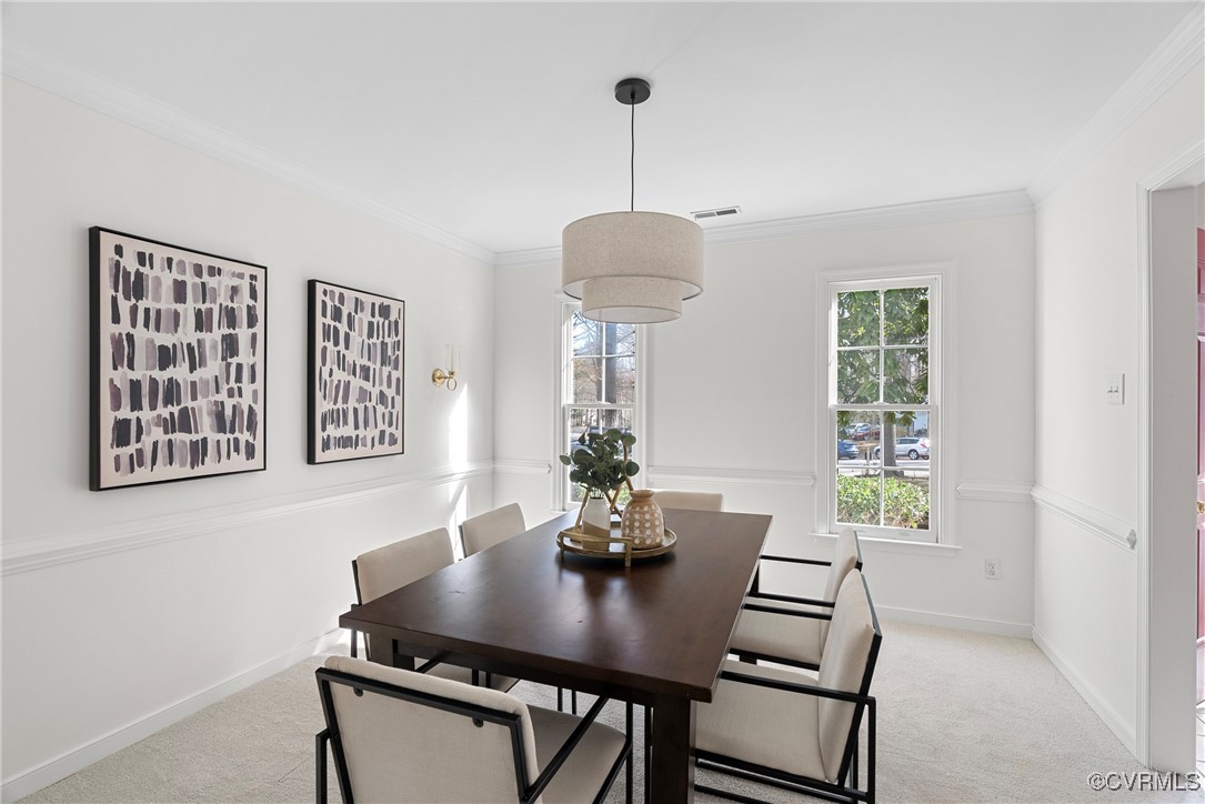 5801 Mill Spring Road Midlothian, VA 23112 - Photo 24 of 49 a view of a dining room with a table and chairs