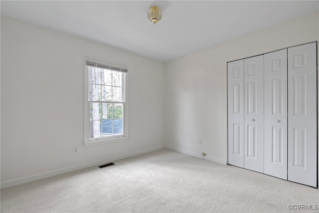 5801 Mill Spring Road Midlothian, VA 23112 - Photo 39 of 49 an empty room with windows