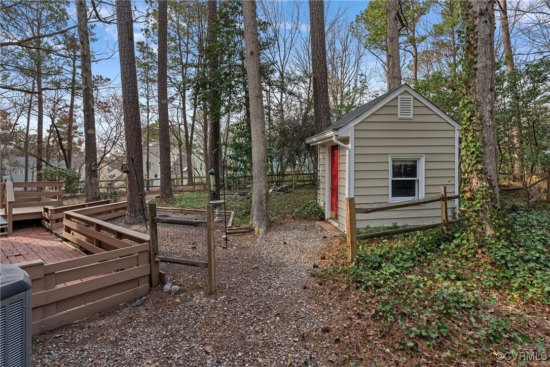 5801 Mill Spring Road Midlothian, VA 23112 - Photo 44 of 49 a view of a house with a yard
