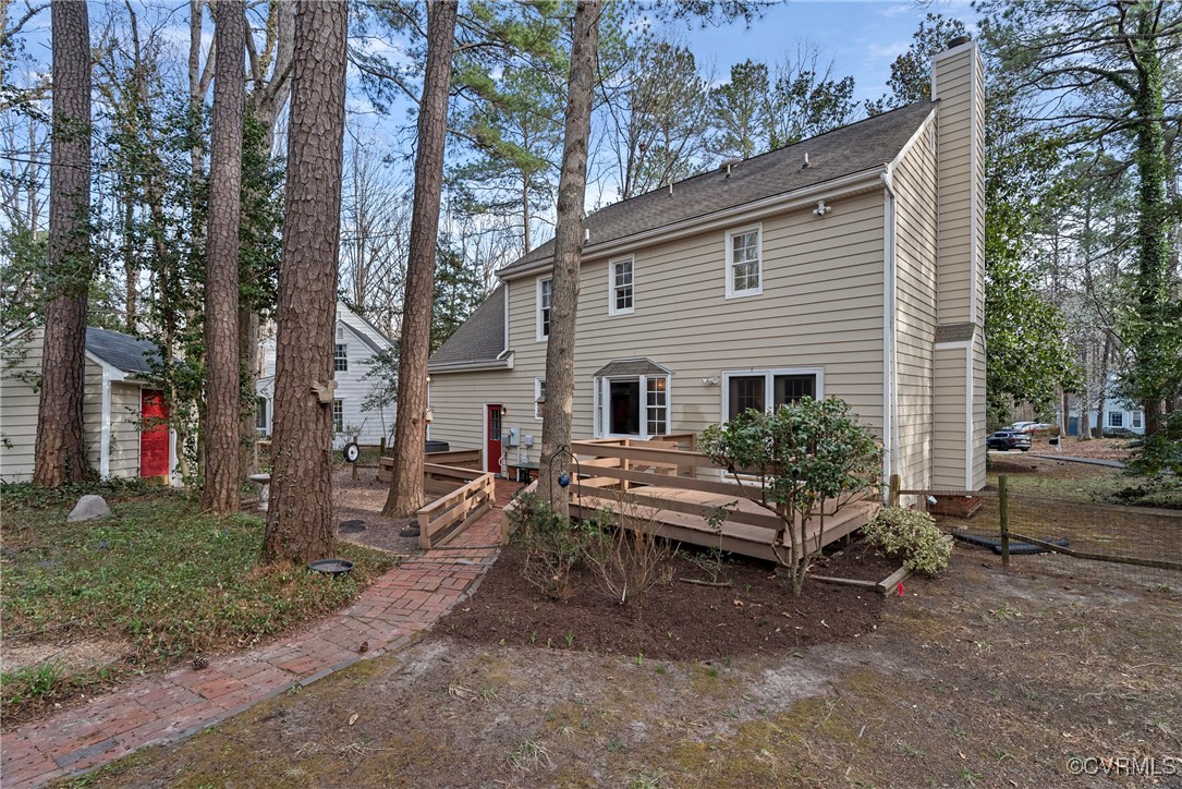 5801 Mill Spring Road Midlothian, VA 23112 - Photo 47 of 49 a view of a house with backyard and sitting area