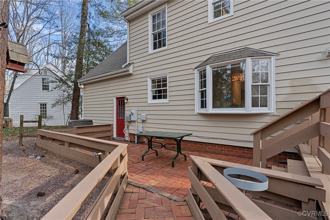 5801 Mill Spring Road Midlothian, VA 23112 - Photo 49 of 49 a view of a house with a deck and furniture