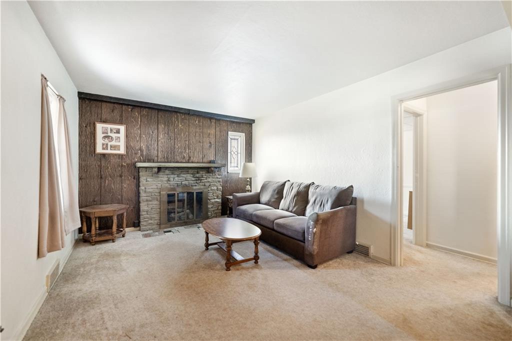 551 Greenlee Road Pittsburgh, PA 15227 - Photo 4 of 38 Walk into find the family room w/ cozy fireplace...